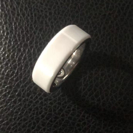 Smart Health Ring Bluetooth Black on a textured black background, showcasing its sleek design and technology.