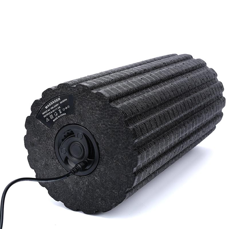 4-Speed Vibrating Foam Roller with textured surface and control panel for enhanced muscle recovery.