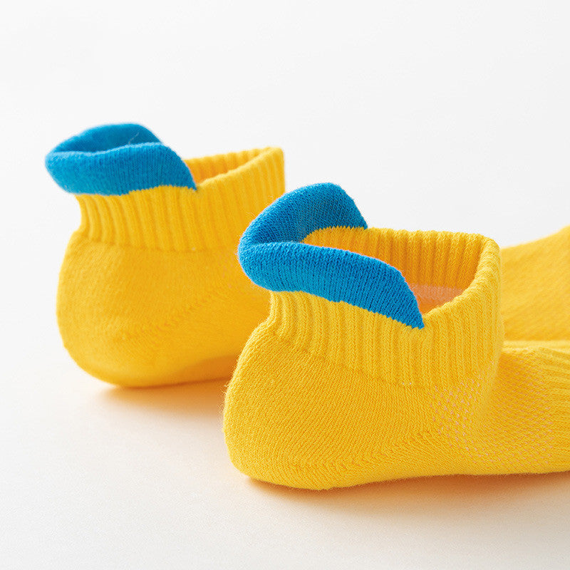 Women's Performance Running Socks in vibrant yellow with blue accents, designed for comfort and durability.