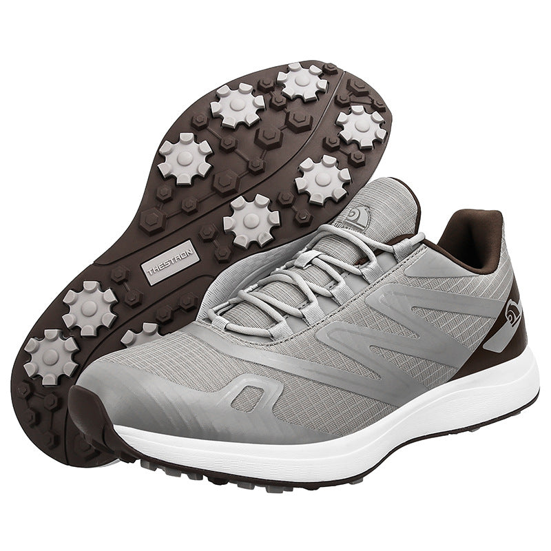 Breathable men's golf sneakers with mesh upper, designed for comfort and traction on the golf course.