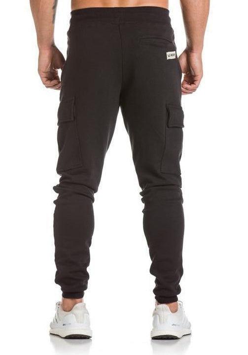 Back view of Men's Cargo Joggers showcasing tapered fit and utility pockets for versatile casual style.