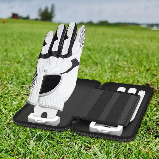 Double glove bag with golf glove and brackets for marking storage on green grass.