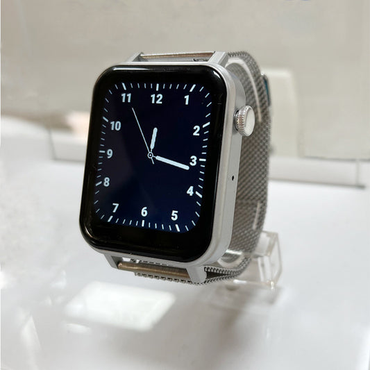 Smart watch heart rate tracking displayed on a stand, showcasing a sleek design and clear touchscreen.